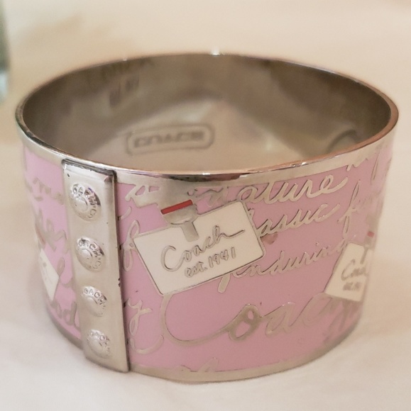Coach Jewelry - Coach, wide silver bangle with whimsical design Coach Jewelry - Coach, wide silver bangle with whimsical design
